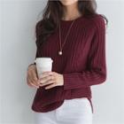Round-hem Cable-knit Sweater