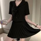 Bow Accent Short-sleeve Shirt / Pleated Skirt