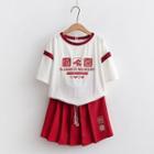 Set: Short-sleeve Embroidered T-shirt + Tasseled Mini Skirt