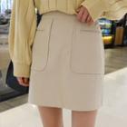 Pocket-front Zip-back Mini Skirt