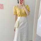 Puff-sleeve V-neck Blouse / Floral Embroidered A-line Midi Skirt