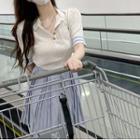 Short-sleeve Polo Collar Knit Top / High-waist Pleated A-line Mini Skirt