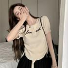 Round-neck Drawstring Lettering Cropped Top Almond - One Size
