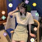 Short-sleeve Letter T-shirt / Plaid Skirt