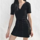Set: Studded V-neck Short-sleeve T-shirt + A-line Skirt