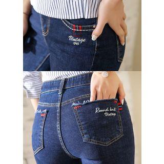 Letter-embroidered Frayed Boot-cut Jeans
