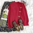 Long-sleeve Cut-out Bow Knit Sweater / Floral Printed Midi Skirt