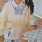 Embroidered Argyle Sweater