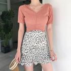 Tie-back Light Knit Top / Ruched Floral Mini Skirt