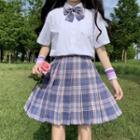 Short-sleeve Shirt / Bow Tie / Plaid Pleated Skirt