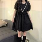 Short-sleeve Ruffle Trim Embellished A-line Dress Black - One Size