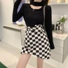 Long-sleeve Cutout T-shirt / Asymmetrical Checker Print A-line Skirt