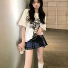 Crewneck Printed Oversize Top / Plaid Pleated A-line Mini Skirt