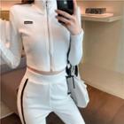 Letter Embroidered Zip Cropped Jacket / Striped Boot-cut Pants