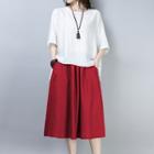 Set: Crew-neck Elbow-sleeve Top + Plain A-line Skirt