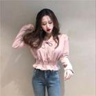 Long-sleeve Tie-neck Smocked Knit Top