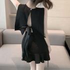 Set: Sleeveless Bow-back Blouse + A-line Skirt