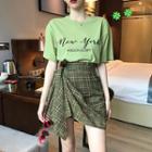 Elbow-sleeve Letter T-shirt / Asymmetric Plaid Mini Skirt