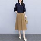 Set: Short-sleeve Floral Cutout Blouse + Midi A-line Skirt