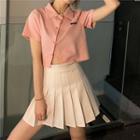 Short-sleeve Applique Asymmetric Polo Shirt / High-waist Plain Pleated Skirt
