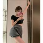 Short-sleeve Button-up Crop Top / Frill Trim Skort