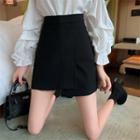 High-waist Asymmetric Mini Skirt