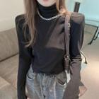 Long-sleeve Shoulder-padded Turtleneck Top