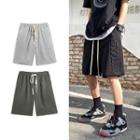 Letter Embossed Straight Leg Sweatshorts