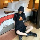 Printed Orange Black Short-sleeved Top / Black Vest Shorts