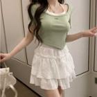 Mock Two-piece Short-sleeve Asymmetrical Cropped T-shirt / Mini A-line Skirt