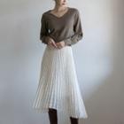 Asymmetric Frayed Long Pleated Skirt