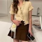 Short-sleeve Ruffle Trim Button-up Crop Top / Pleated Mini Skirt