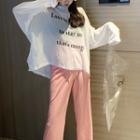 Lettering Cut-out Long-sleeve T-shirt / Drawstring Wide-leg Pants