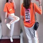 Set: Short-sleeve T-shirt + Lettering Sweatpants