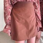 Pleated-detail Buckled A-line Miniskirt