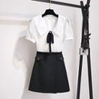 Set: Short-sleeve Collared Top + A-line Skirt