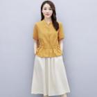 Set: Short-sleeve Stand-collar Blouse + A-line Midi Skirt