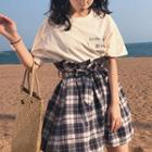Set: Lettering Loose-fit Short-sleeve T-shirt + Plaid Skirt