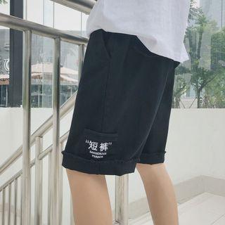 Fringed Lettering Pocketed Shorts