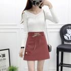 Set: Long-sleeve Cold-shoulder Knit Top + Embroidered Mini A-line Skirt