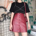 Short-sleeve Beaded T-shirt / Buttoned A-line Faux Leather Skirt