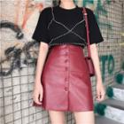 Short-sleeve Beaded T-shirt / Buttoned A-line Faux Leather Skirt