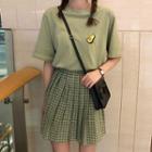 Fruit Embroidered T-shirt / Plaid Pleated Mini Skirt