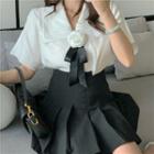 Short-sleeve Tie-neck Floral Blouse / Asymmetric A-line Skirt