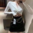Long-sleeve Cropped T-shirt / Chained A-line Skirt