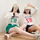 Round-neck Printed Oversized Top / High-waist Plan Wide Leg Shorts