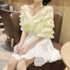 Elbow-sleeve Ruffled Blouse / A-line Skirt