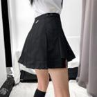Dip-back Pleated Mini Skirt