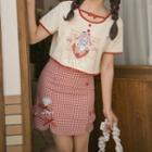 Short-sleeve Cartoon Print Cutout T-shirt / Ruffled Gingham A-line Skirt