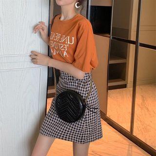 Set: Short-sleeve Letter T-shirt + Plaid Skirt
